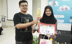 Widia Nurhalisa, siswi kelas XI MA Nurul Huda Yaspin asal Parung Kuda meraih juara 1 MTQ di BSI Flash 2025.