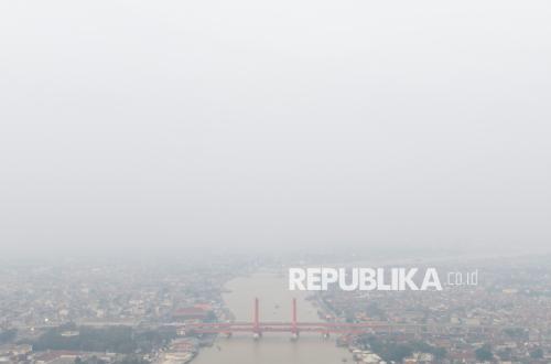 Kabut Asap Selimuti Kota Palembang, Dampak Karhutla Meluas di Sumatera