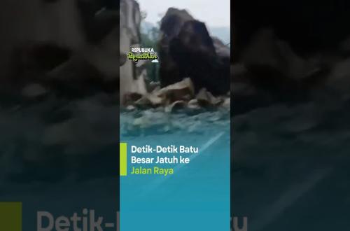 DetikDetik Batu Besar Jatuh ke Jalan Raya