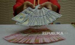 In Picture: Rupiah Menguat Tipis ke Rp15.262 Dolar AS