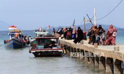 In Picture: Musim Libur Pulau Pahawang Lampung Ramai oleh Wisatawan