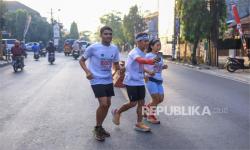 Pasangan Hendra dan Patricia, serta Ankit Berlari demi Galang Donasi untuk Gaza
