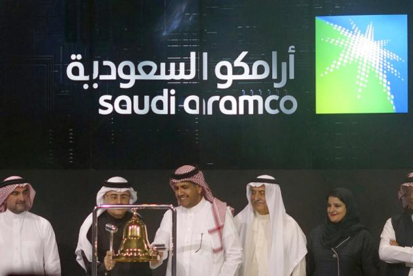 Debut Aramco saat pertama kali melantai di bursa efek Arab Saudi pada 11 Desember 2019. Saudi Aramco Ambil Alih Takhta Microsoft Sebagai Perusahaan Kedua Terbesar Dunia. Foto: AP Photo/Amr Nabil