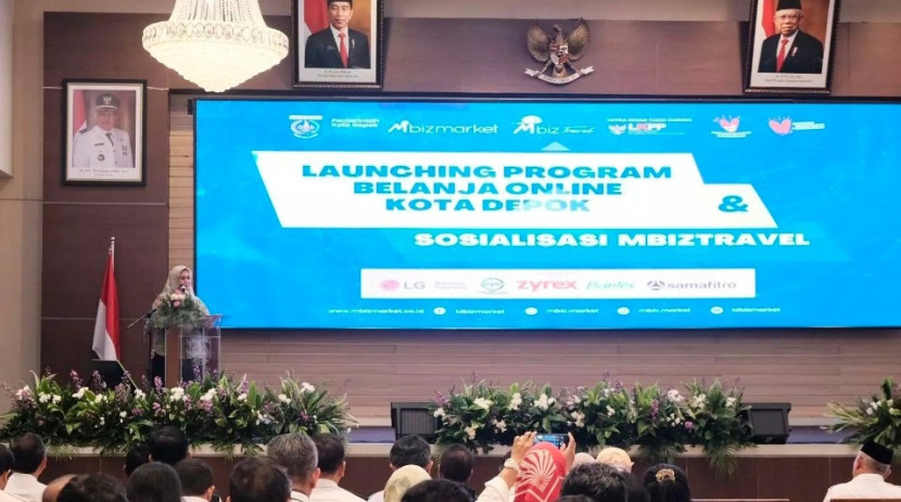 Kepala Bagian Pengadaan Barang dan Jasa pada UKPBJ Setda Kota Depok, Indah Lestari Dewi saat menyampaikan laporan pada acara Launching Program Belanja Online Kota Depok dan Sosialisasi Mbiztravel. (Foto: Dok Diskominfo Kota Depok)