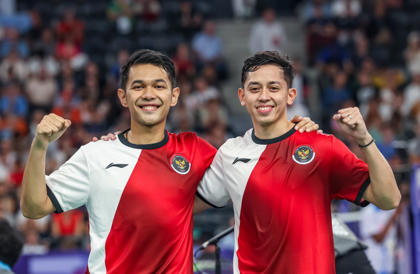 Pasangan ganda putra Fajar Alfian/Muhammad Rian Ardianto memenangi laga perdana di fase grup Olimpiade 2024. (Source photo: PBSI/Badmintonphoto/Mikael Ropars)