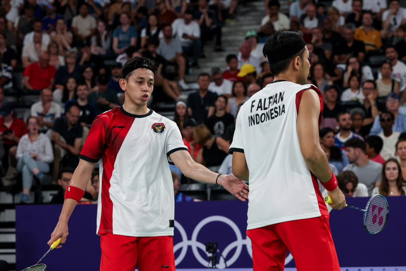 Pasangan ganda putra Fajar Alfian/Muhammad Rian Ardianto lolos ke babak perempat final Olimpiade 2024. (Source: PBSI/Badmintonphoto/Yohan Nonotte)