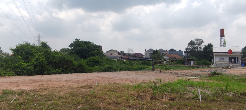 Areal rawa konservasi yang sebagian telah ditimbun di Jalan Macan Kumbang IX. (FOTO: Dok. Walhi Sumsel)