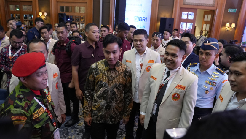 Wakil Presiden Gibran Rakabuming bersama dengan Ketua PP Muhammadiyah Dzulfikar Ahmadi Tawalla Sumber:panitia