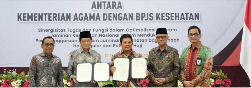 Penandatanganan MoU BPJS Kesehatan dengan Kementerian Agama tentang Sinergisitas Tugas dan Fungsi dalam Optimalisasi Program Jaminan Kesehatan Nasional serta Penandatanganan Perjanjian Kerja Sama Tentang Penyelenggaraan Program Jaminan Kesehatan Bagi Jemaah Haji Reguler dan Petugas Haji. Hadir dalam kegiatan tersebut, Menteri Koordinator Pembangunan Manusia dan Kebudayaan, Menteri Agama, Kepala Badan Penyelenggara Haji, dan Kepala Badan Pengelola Keuangan Haji di Kantor Kementerian Koordinator Bidang Pembangunan Manusia dan Kebudayaan (PMK).