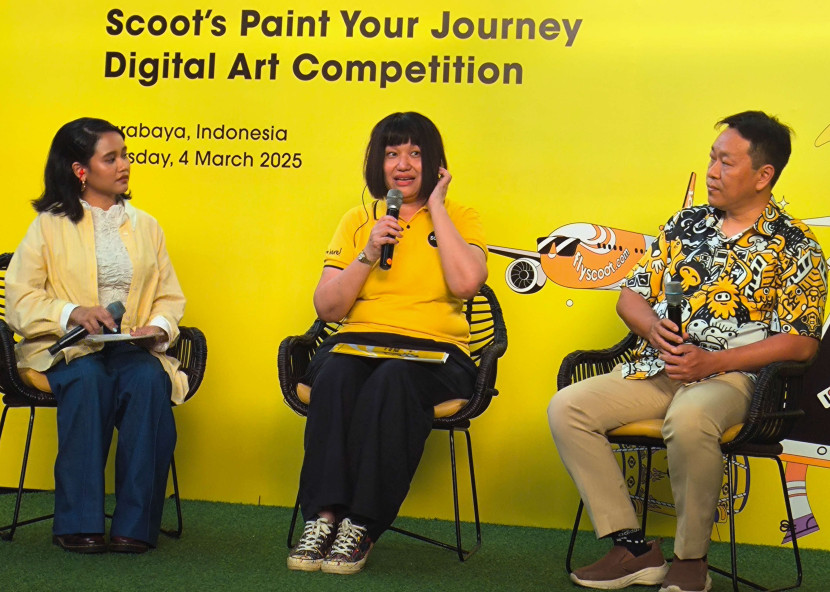 Director of Marketing, Communications, & Loyalty Scoot Airlines, Agatha Yap (tengah) memaparkan terkait kompetisi melukis digital bertema 'Paint Your Journey' yang diluncurkan di Surabaya, Selasa (4/3/2025). Sekitarsurabaya.com/ Dadang Kurnia