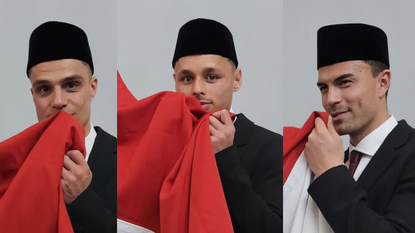 Joey Pelupessy, Dean James, dan Emil Audero mencium bendera Merah Putih usai mengucap sumpah sebagai WNI.