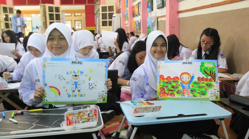Memperingati Hari Anak Nasional 2025, MILKU susu Ultra High Temperature (UHT) berkualitas dari WINGS Food, hadir lebih dekat dengan anak-anak di sejumlah sekolah di Jawa Barat. (Foto: Dok WINGS Food) 