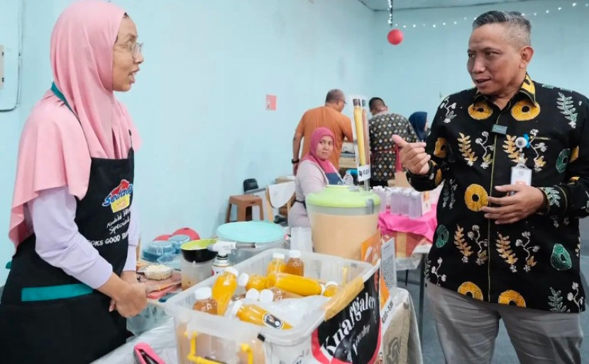 Kepala DKUM Depok, Mohamad Thamrin (kanan). (Foto: Dok Diskominfo Kota Depok)