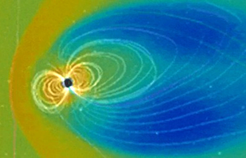 Magnetosfer Bumi terbentuk oleh interaksi antara medan geomagnetik planet dan angin matahari/NASA's Scientific Visualization Studio