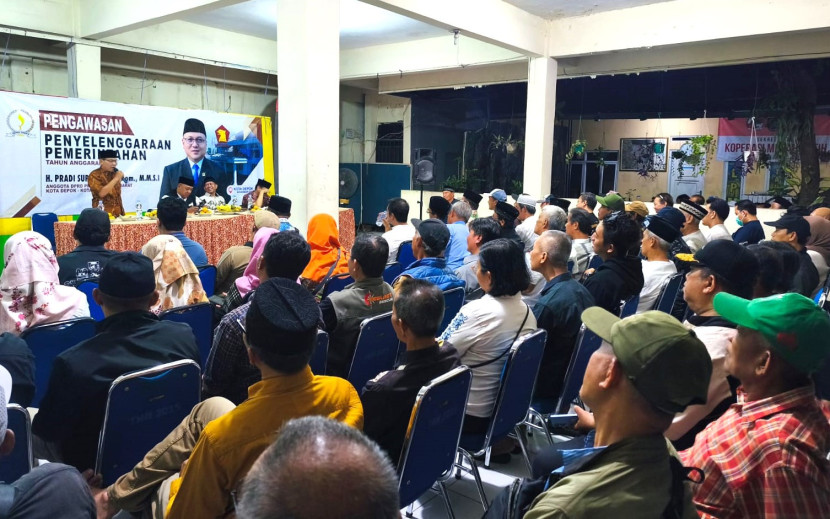 Ketua KKMP Tanah Baru, Naiman, menjelaskan keberadaan koperasi merah putih.