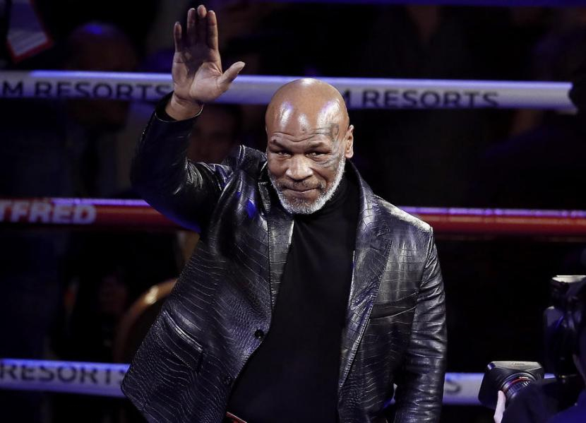 Mike Tyson legendaris tinju Amerika Serikat. Foto: EPA/ETIENNE LAURENT