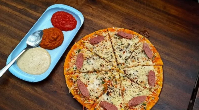 Pizza andaliman ini bisa ditemukan di sebuah kafe yang terletak di Jalan Tarutung KM 1 Sangkar Ni Huta, Kabupaten Toba (sumber: antaranews)