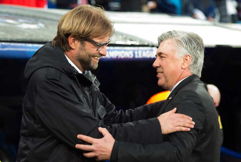 Pelatih Liverpool Jurgen Klopp dan Pelatih Real Madrid Carlo Ancelotti. (EPA-EFE)