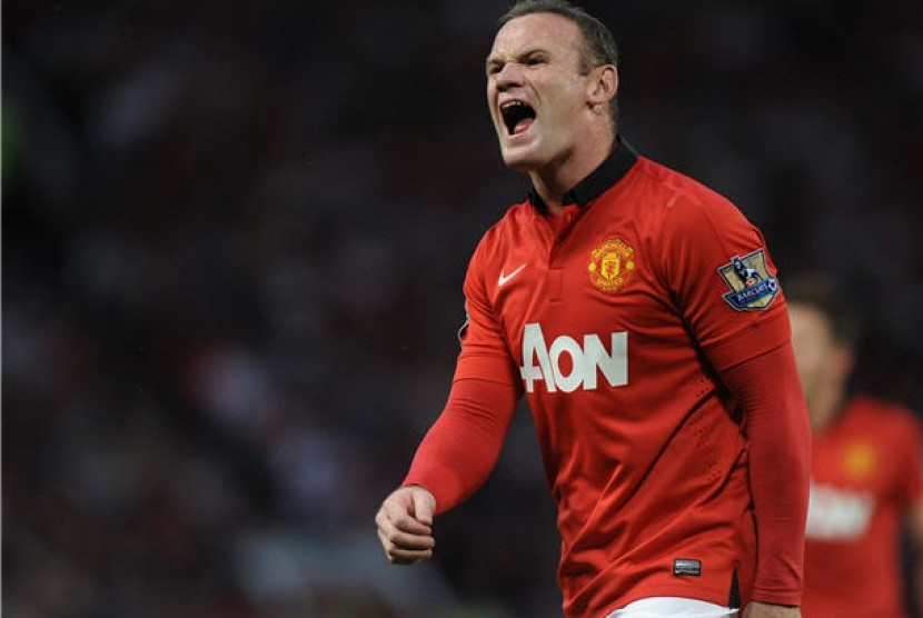 Wayne Rooney saat memperkuat Manchester United.