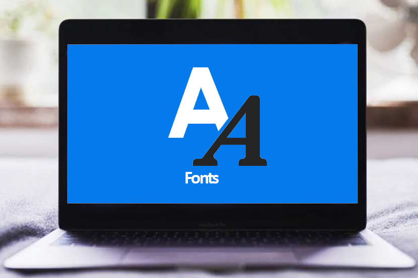 Ilustrasi fonts di laptop Windows.