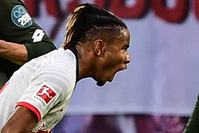 Penyerang sayap RB Leipzig, Christopher Nkunku usai mencetak gol.