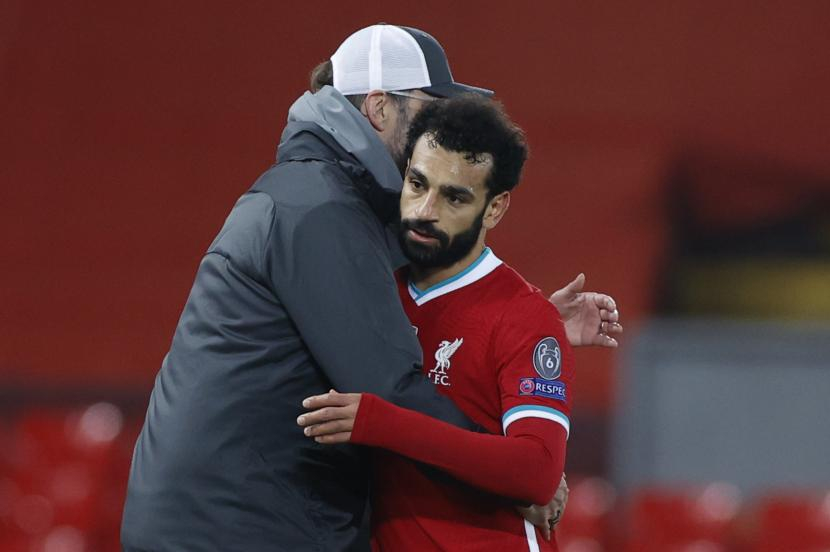 Pelatih Liverpool Jurgen Klopp dan Mohammed Salah. Ilustrasi. Sumber: republika.co.id