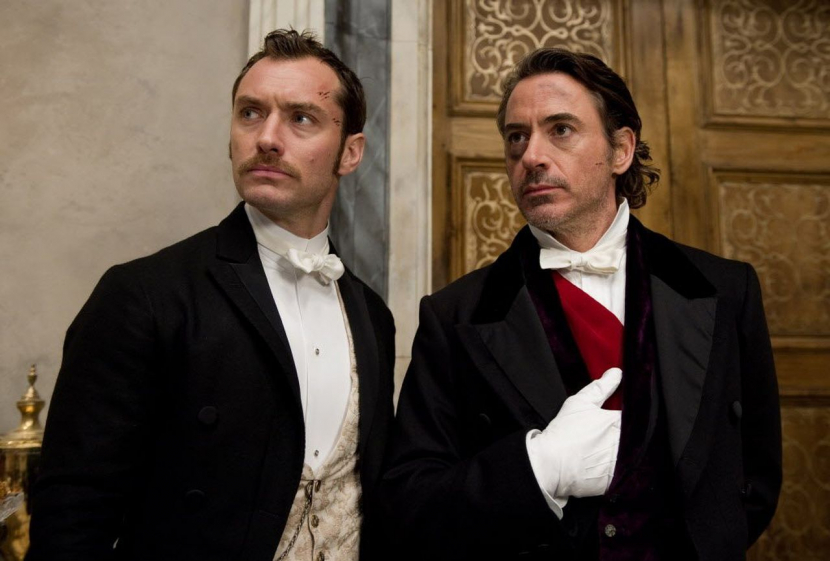 Jude Law dan Robert Downey Jr. dalam salah satu adegan di Sherlock Holmes: A Game of Shadows tahun 2011. Sumber : Collider 
